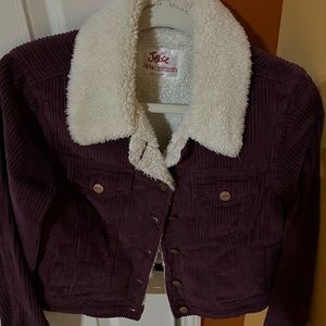 Gently Used Justice jacket . Color purple.